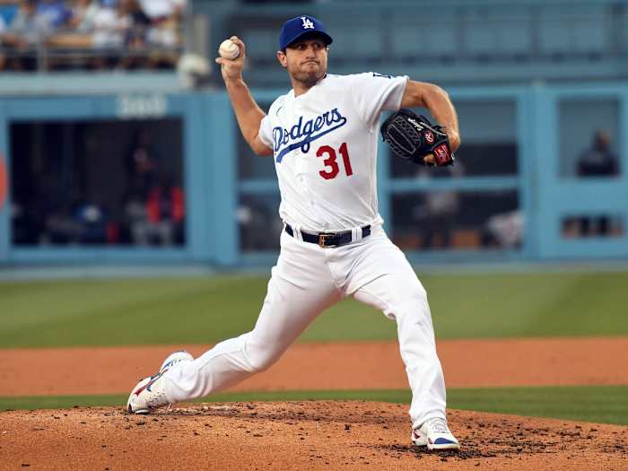 Aug 4, 2021; Los Angeles, California, USA; Los Angeles Dodgers starting pitcher Max Scherzer (31) throws against the Houston Astros during the second inning at Dodger Stadium.